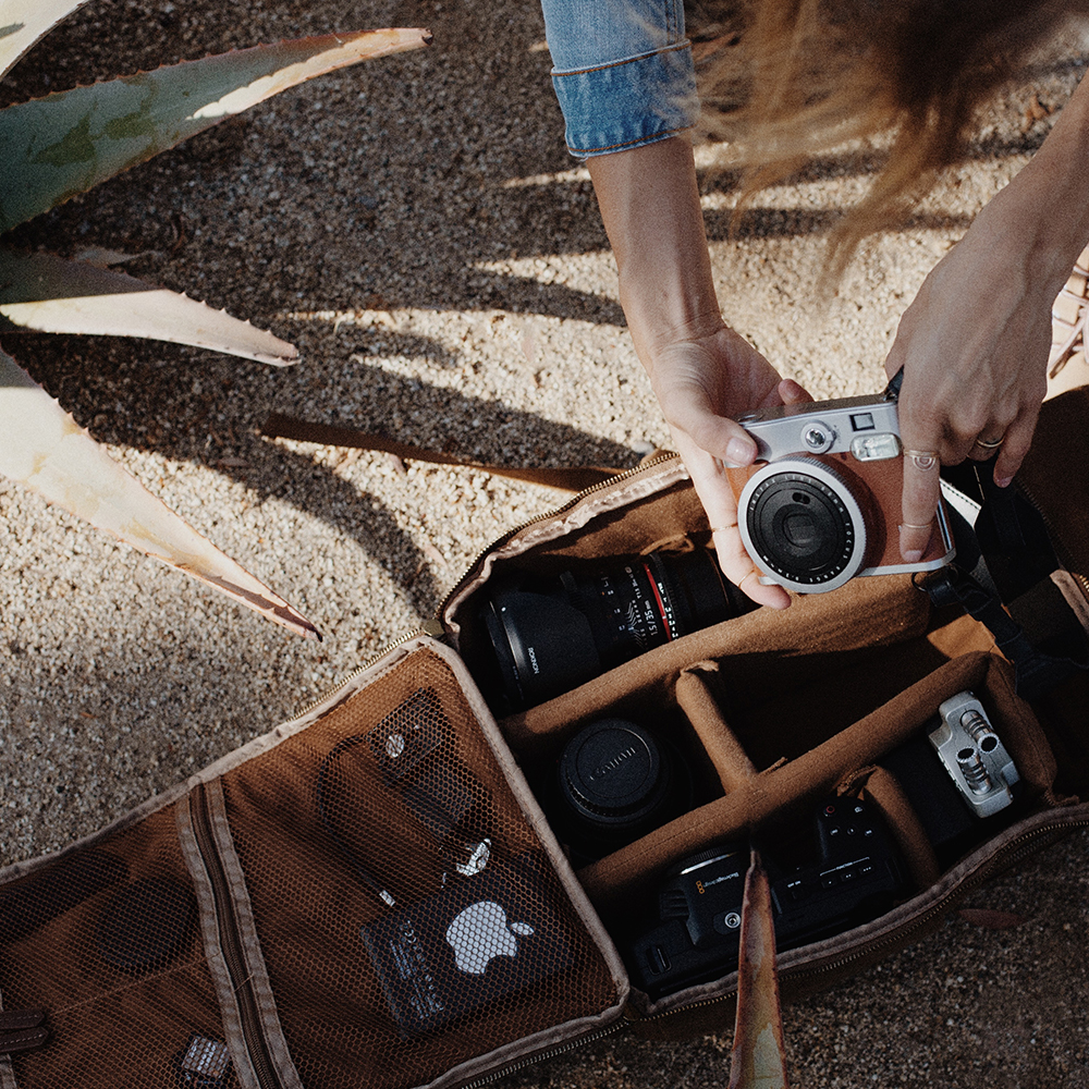 The functional main pocket of the Native Soul Trading Co. camera bag includes dividers and zipper all the way down.